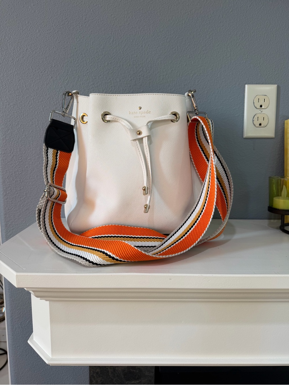 kate spade Vintage White Leather Drawstring Bucket Bag with Orange-Striped Strap